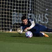 Guglielmo Vicario of Italy warms up during a training session for the UEFA Nations League (Photo by Claudio Villa/Getty Images)