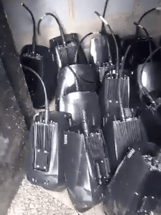 The clip shows a pile of what appear to be ULEZ numberplate cameras stacked in a shed (Photo: Twitter)