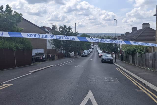 The police cordon on Ladbrook Road near Crystal Palace’s Selhurst Park stadium, where Nelly Akomah was found dead in her own home. (Photo SWNS)