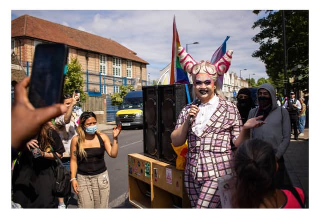Drag Artist That Girl addressing crowds outside the Honor Oak Pub. Credit: Aaron Coe