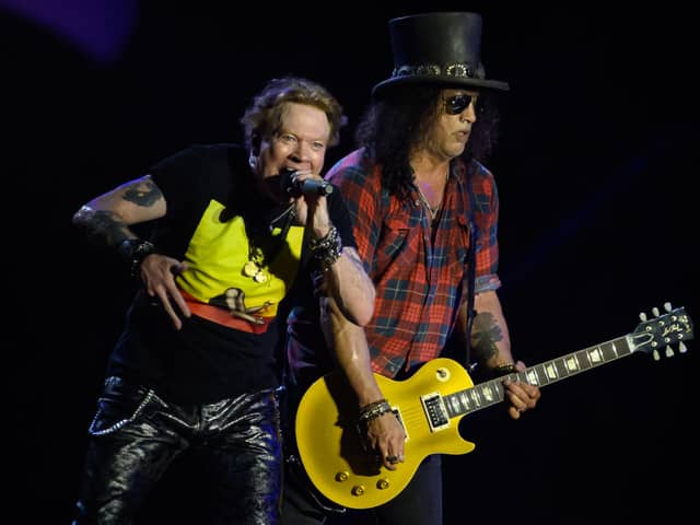 Axl Rose (L) and Slash of Guns ‘n’ Roses perform on the Pyramid Stage on Day 4 of Glastonbury Festival 2023 on June 24, 2023 