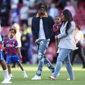  Wilfred Zaha walks around the pitch with this family after the Premier League match  (Photo by Richard Heathcote/Getty Images)