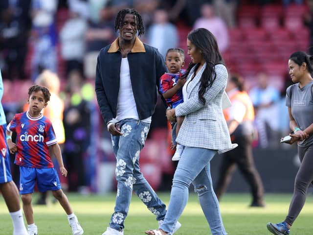  Wilfred Zaha walks around the pitch with this family after the Premier League match  (Photo by Richard Heathcote/Getty Images)