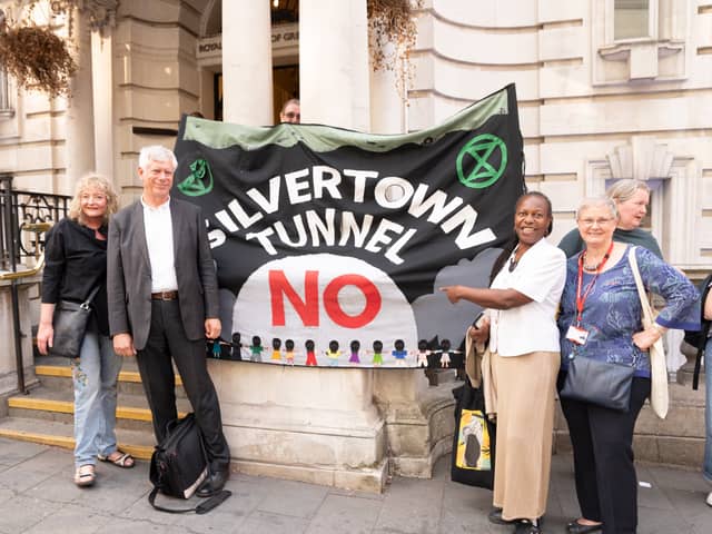 Councillors and campaigners stood outside Greenwich town hall, including Cllr Majella Anning (r), who proposed the motion. Credit: Karin Tearle.