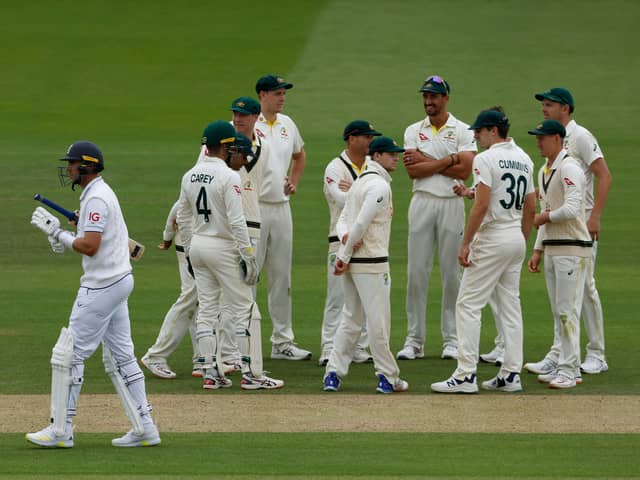 England's Stuart Broad (L) walks back to the pavilion after losing his wicket for 12 runs on day three of the second Ashes cricket Test match between England and Australia at Lord's cricket ground in London on June 30, 2023. (Photo by Ian Kington / AFP) / RESTRICTED TO EDITORIAL USE. NO ASSOCIATION WITH DIRECT COMPETITOR OF SPONSOR, PARTNER, OR SUPPLIER OF THE ECB (Photo by IAN KINGTON/AFP via Getty Images)