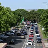 Cars queuing in Twickenham on their way to central London. Credit: Justin Tallis/AFP via Getty Images.