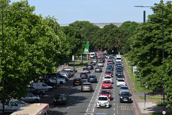 Cars queuing in Twickenham on their way to central London. Credit: Justin Tallis/AFP via Getty Images.