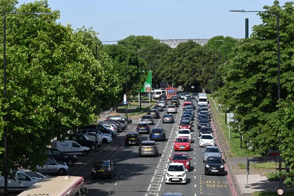 Cars queuing in Twickenham on their way to central London. Credit: Justin Tallis/AFP via Getty Images.
