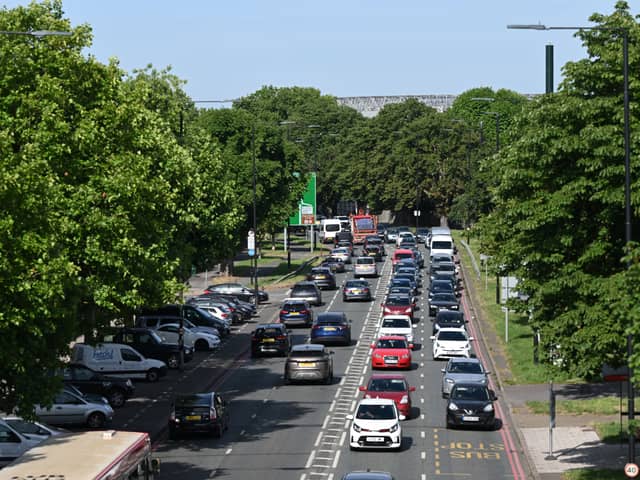 Cars queuing in Twickenham on their way to central London. Credit: Justin Tallis/AFP via Getty Images.