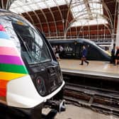 The Elizabeth line has been wrapped in rainbow colours for Pride. Credit: TfL