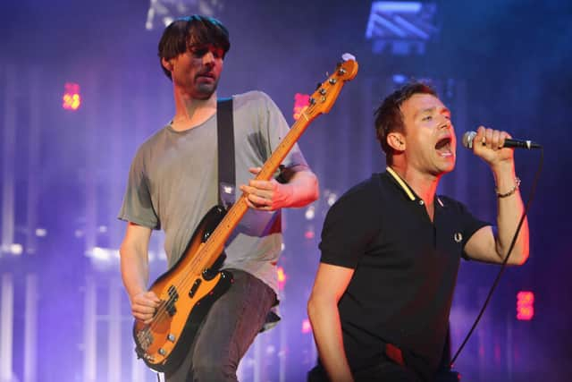 Damon Albarn and Alex James on the main Pyramid Stage at the Glastonbury Festival in 2009.  (Photo by Matt Cardy/Getty Images)