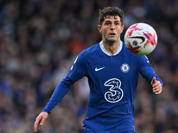 Chelsea’s US midfielder Christian Pulisic controls the ball during the English Premier League football match between Chelsea and Everton (Photo by GLYN KIRK/AFP via Getty Images)