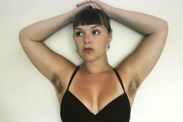 Joanna Brown showing off her hairy armpits. (Photo by Joanna Brown/SWNS)