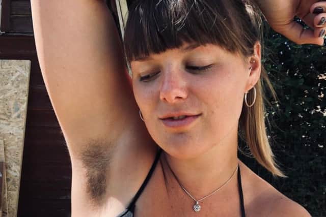 Joanna Brown showing off her hairy armpits. (Photo by Joanna Brown/SWNS)