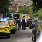 Police and emergency services attend the scene of a car crash at The Study Preparatory School in Wimbledon