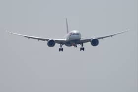 A British Airways aircraft prepares to land. (Photo by AAMIR QURESHI/AFP via Getty Images)