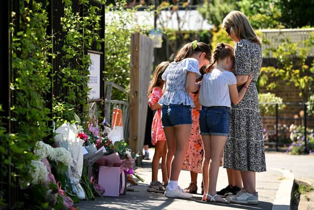 Floral tributes have been left outside the Study Preparatory School in Wimbledon