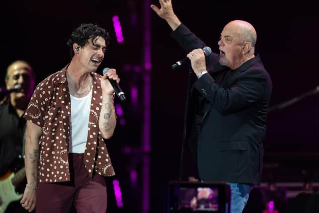 Joe Jonas with Billy Joel at BST Hyde Park. (Photo by Dave Hogan/Hogan Media/Shutterstock)