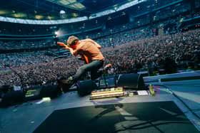 Graham Coxon with Blur at Wembley Stadium. (Photo by Phoebe Fox)