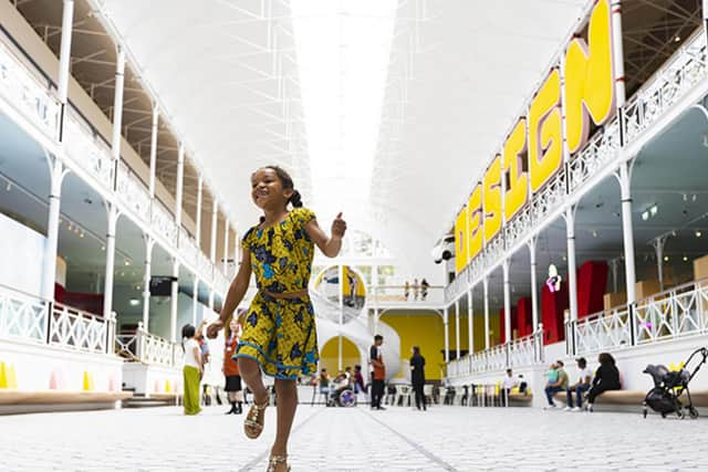 Child dancing at Young V&A exhibition hall