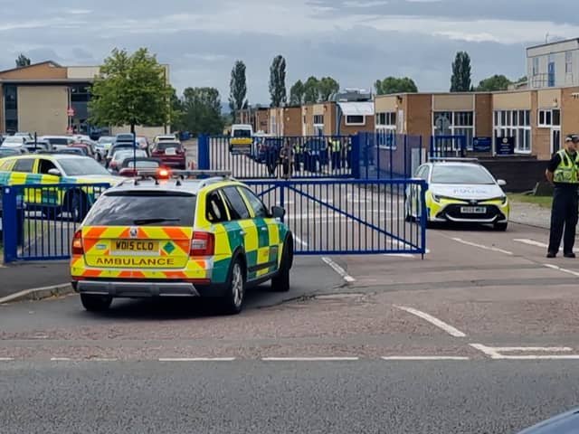 A teenage boy has been arrested after a teacher was stabbed at a secondary school in Tewkesbury, Gloucestershire 