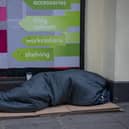 A homeless person sleeps on the streets in London. Credit: Carl Court/Getty Images.