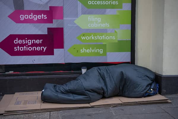A homeless person sleeps on the streets in London. Credit: Carl Court/Getty Images.