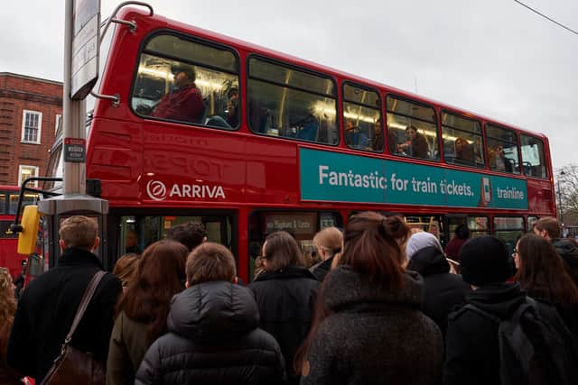 Commuters piling onto a London bus. Credit: Niklas Halle’n/AFP via Getty Images.
