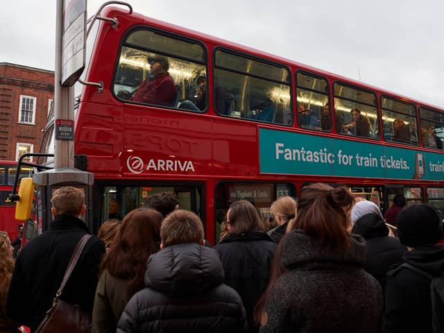 Commuters piling onto a London bus. Credit: Niklas Halle’n/AFP via Getty Images.