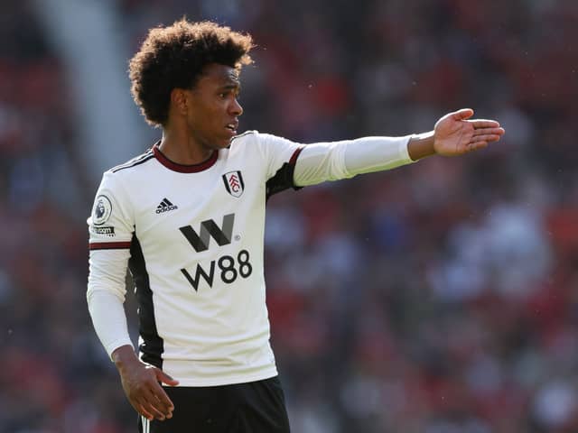 Willian of Fulham gestures during the Premier League match between Manchester United and Fulham FC  (Photo by Matt McNulty/Getty Images)