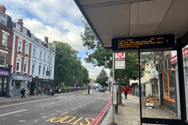 ‘Authenticating’ - A malfunctioning bus timetable sign in Upper Street, Islington. (Photo by André Langlois)