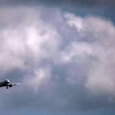 A jet comes in to land at Gatwick Airport. (Photo by Ben Stansall / AFP via Getty Images)