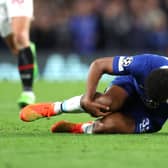 Wesley Fofana of Chelsea is seen injured during the UEFA Champions League group E match between Chelsea FC and AC Milan (Photo by Catherine Ivill/Getty Images)