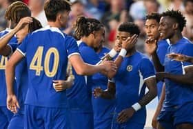 Ian Maatsen #38 of Chelsea FC celebrates with teammates after a goal against Wrexham  (Photo by Grant Halverson/Getty Images)