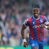 Wilfried Zaha of Crystal Palace celebrates after scoring the team’s second goal during the Premier League (Photo by Tom Dulat/Getty Images)