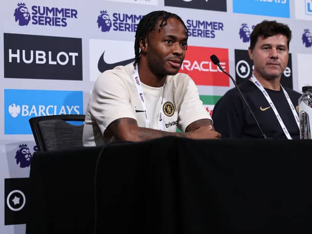 Raheem Sterling #17 and manager Mauricio Pochettino of Chelsea FC speak during a Premier League (Photo by Tim Nwachukwu/Getty Images for Premier League)