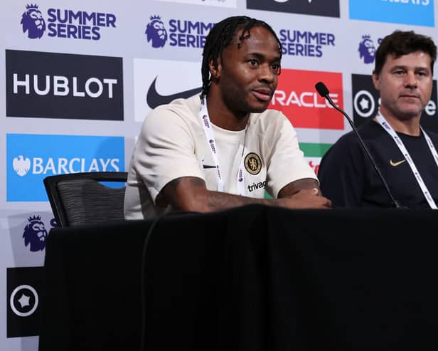 Raheem Sterling #17 and manager Mauricio Pochettino of Chelsea FC speak during a Premier League (Photo by Tim Nwachukwu/Getty Images for Premier League)