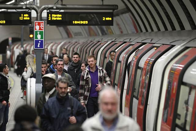 Commuters make their way along a platform at Clapham North Underground station. (Photo by Dan Kitwood/Getty Images)