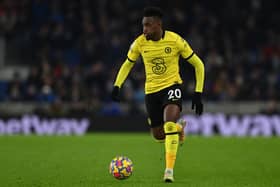 Chelsea’s English midfielder Callum Hudson-Odoi runs with the ball during the English Premier League football match . (Photo by GLYN KIRK/AFP via Getty Images)