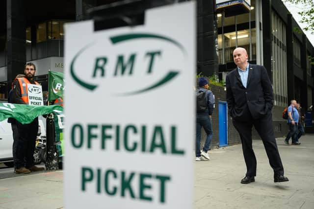 Secretary-General of the National Union of Rail, Maritime and Transport Workers (RMT) Mick Lynch (R). (Photo by Leon Neal/Getty Images)