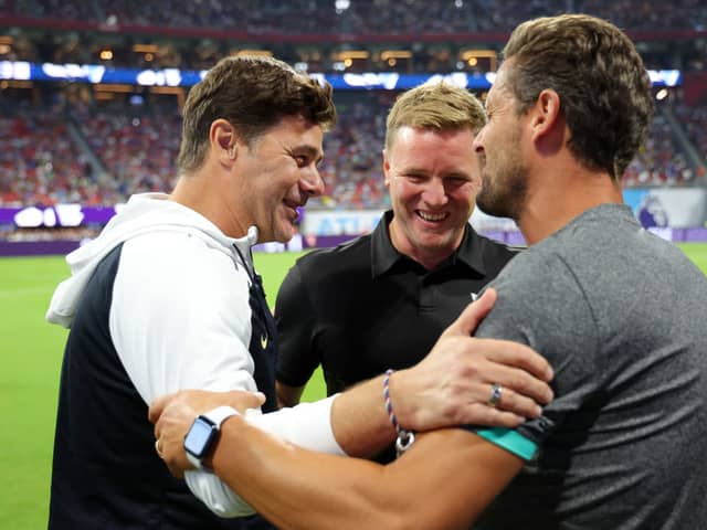  Mauricio Pochettino, Manager of Chelsea, interacts with Eddie Howe, Manager of Newcastle United, Photo by Kevin C. Cox/Getty Images for Premier League)