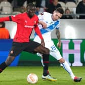 Dynamo Kiev’s Ukrainian midfielder Denys Garmash (R) vise for the ball with Rennes’ French midfielder Lesley Ugochukwu (Photo by JANEK SKARZYNSKI/AFP via Getty Images)