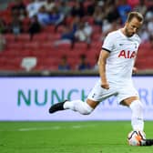 Harry Kane #10 of Tottenham Hotspur scores a penalty for his team’s first goal against the Lion City  (Photo by Yong Teck Lim/Getty Images)