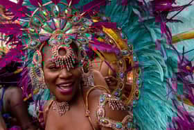 Notting Hill Carnival is held annually on the August bank holiday in west London. Credit: Chris J Ratcliffe/Getty Images.