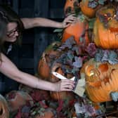 A London Dungeon employee puts the finishing touches to the Halloween installation in 2014. (Photo by Danny E. Martindale/Getty Images)