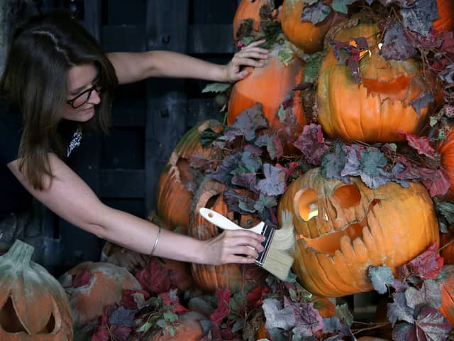 A London Dungeon employee puts the finishing touches to the Halloween installation in 2014. (Photo by Danny E. Martindale/Getty Images)