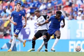  Nicolas Jackson of Chelsea battles for possession with Bobby Reid of Fulham during the Premier League Summer Series match (Photo by Tim Nwachukwu/Getty Images)