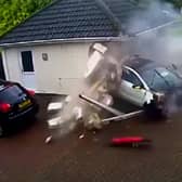 The moment a Mercedes-Benz smashed into a garage in Littleover, Derby. (Photo by Sukie Singh / SWNS)
