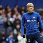 Lewis Hall of Chelsea warms up prior to the Premier League match between Chelsea FC  (Photo by Julian Finney/Getty Images)