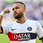 Paris Saint-Germain's Neymar celebrates after scoring a goal against Jeonbuk Hyundai Motors during their friendly football match  (Photo by ANTHONY WALLACE/AFP via Getty Images)